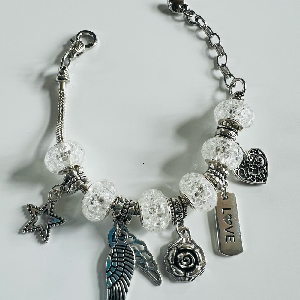 Silver Charm Bracelet with Heart and Star Accents